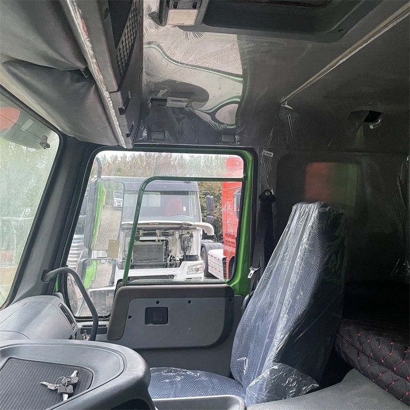 ΣΙΝΟ ΤΡΑΚΚ 12 τροχών 30 κυβικά μέτρα HOWO 40 τόνων 8x4 Χρησιμοποιούμενο φορτηγό απορριμμάτων με απόδοση