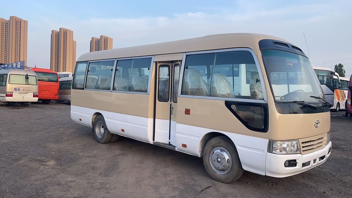 30 θέσεις Luxury Coach Toyo Ta Coaster Bus με μέγιστη ισχύ 113/5200kw και εκπομπές EURO 3