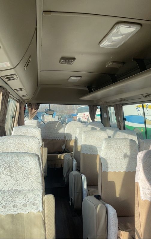 30 θέσεις Luxury Coach Toyo Ta Coaster Bus με μέγιστη ισχύ 113/5200kw και εκπομπές EURO 3