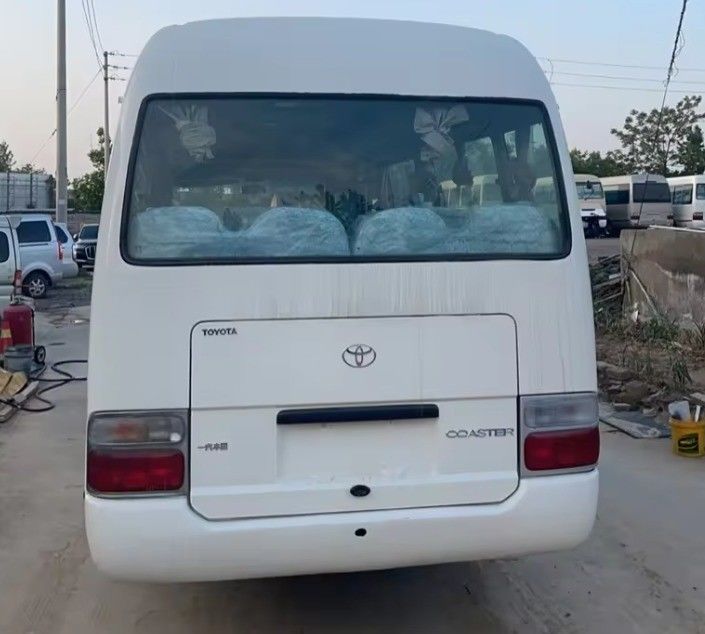 Ανοικτό αριστερό σύστημα οδήγησης Toyota Coaster Bus με 9.00R20 ελαστικά και 113/5200 Max Power