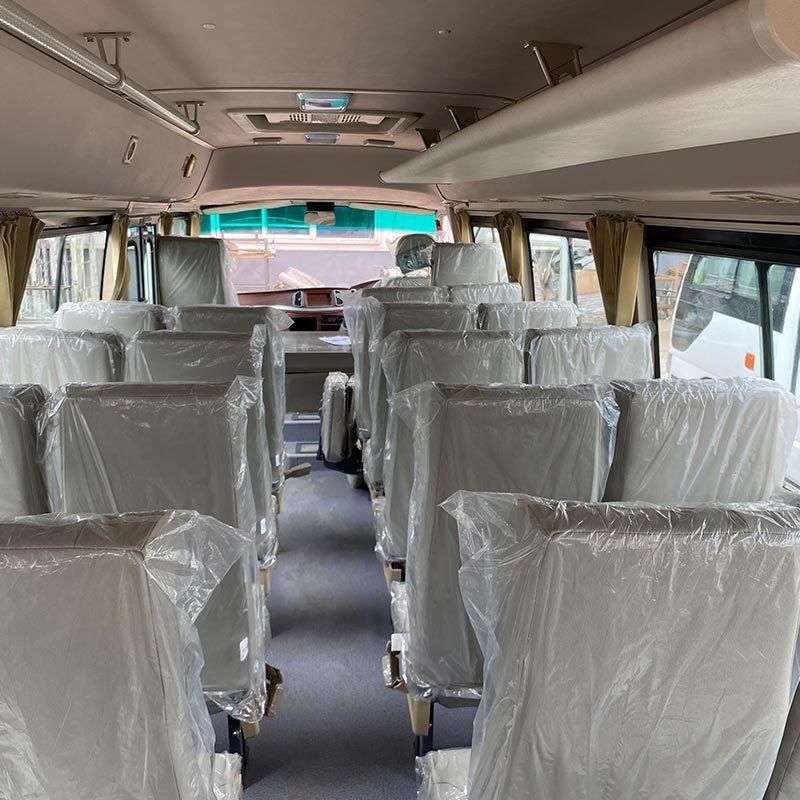 Δεύτερο χέρι τουριστικό λεωφορείο πολυτελείας 2023 Toyo ta Coaster 30 θέσεων LHD RHD κινητήρας ντίζελ