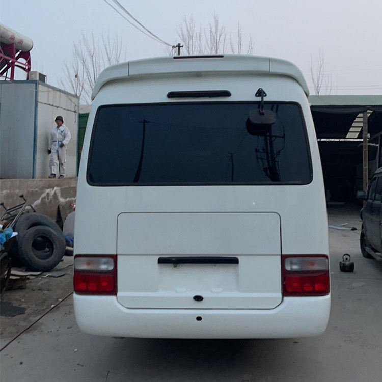 30 θέσεις Χρησιμοποιημένο λεωφορείο Toyota Coaster σε καλή κατάσταση 7005*2040*2785 6-8L χωρητικότητα κινητήρα