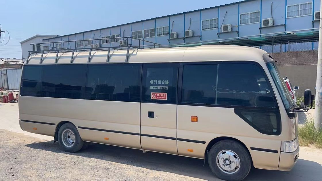 Χρησιμοποιημένο λεωφορείο Toyota Coaster στην Ιαπωνία 30 θέσεις με κινητήρα 1HZ και λάστιχα 9.00R20